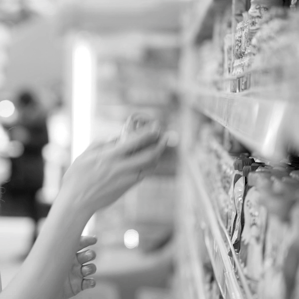 Shopper choosing at the shelf